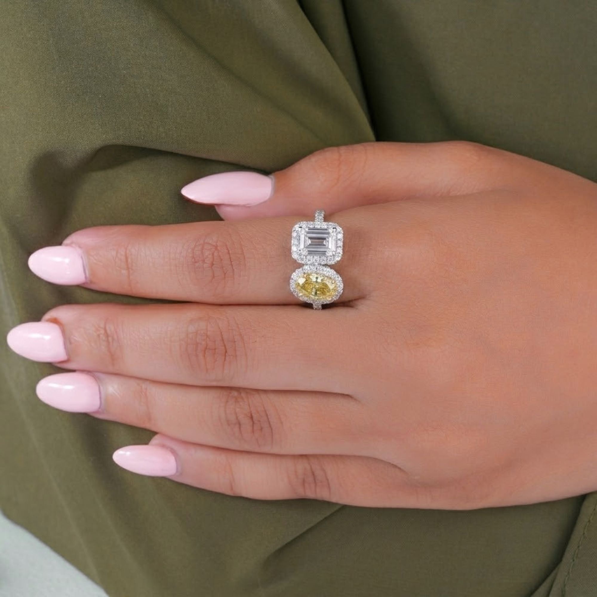 Emerald cut ring with halo diamond ring.
