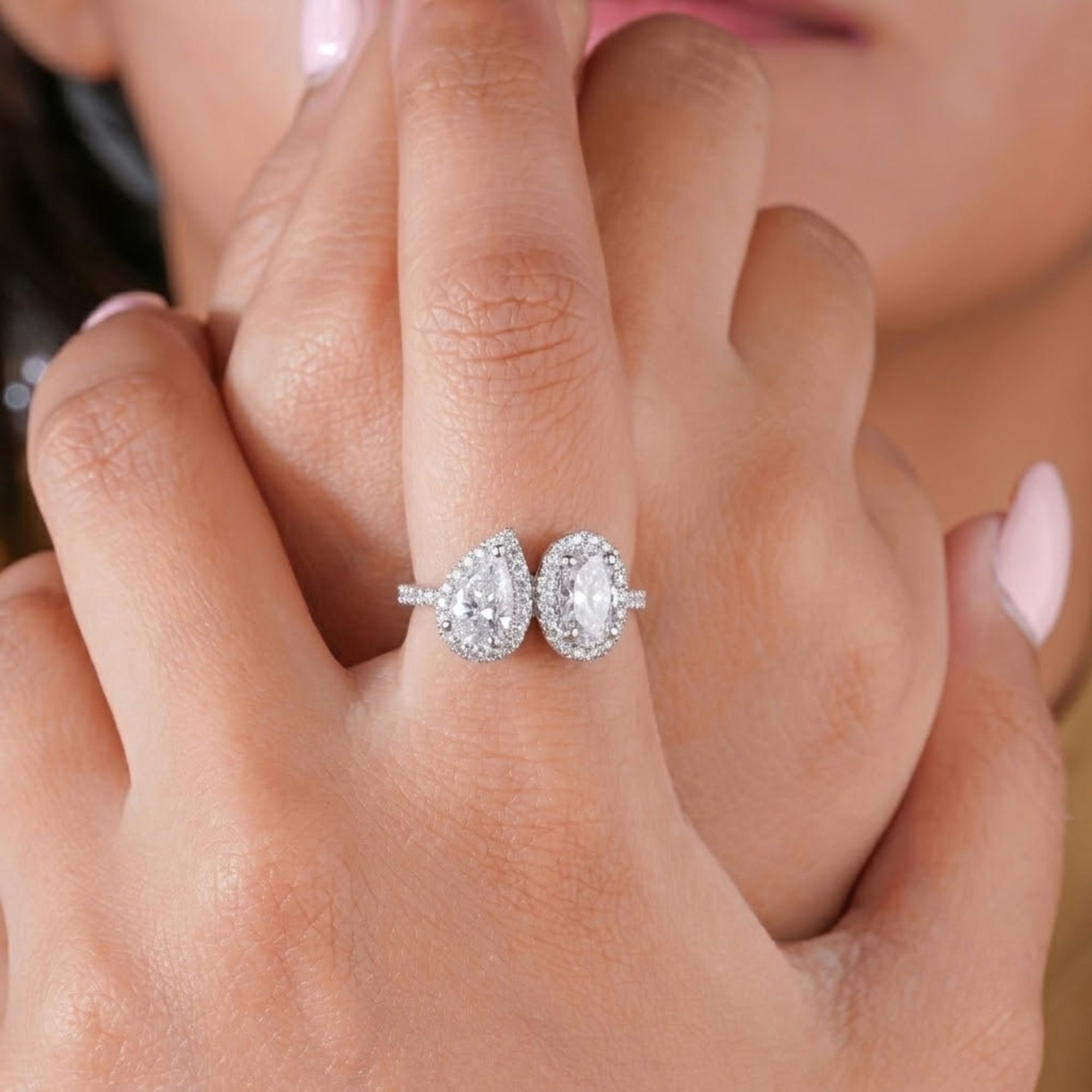 Two stone engagement ring with you and me ring.
