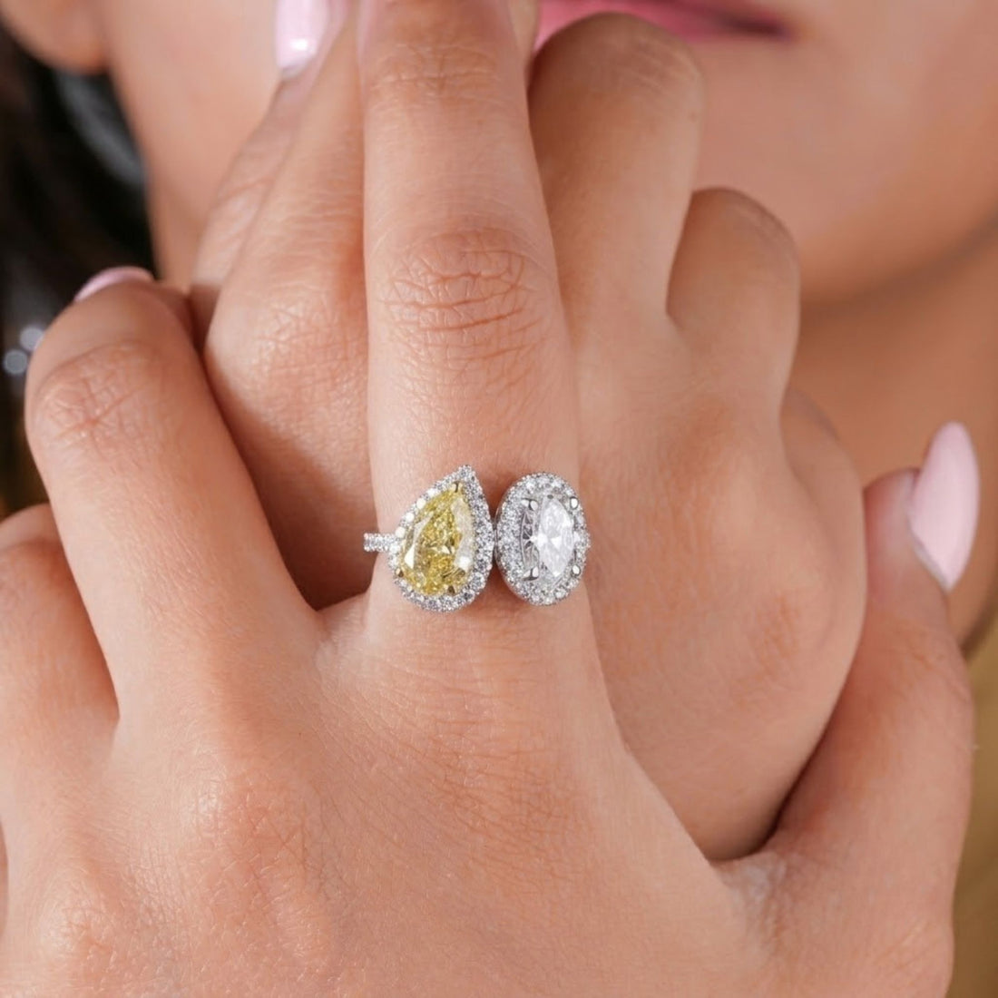 Yellow and white stone ring with two tone gold ring.

