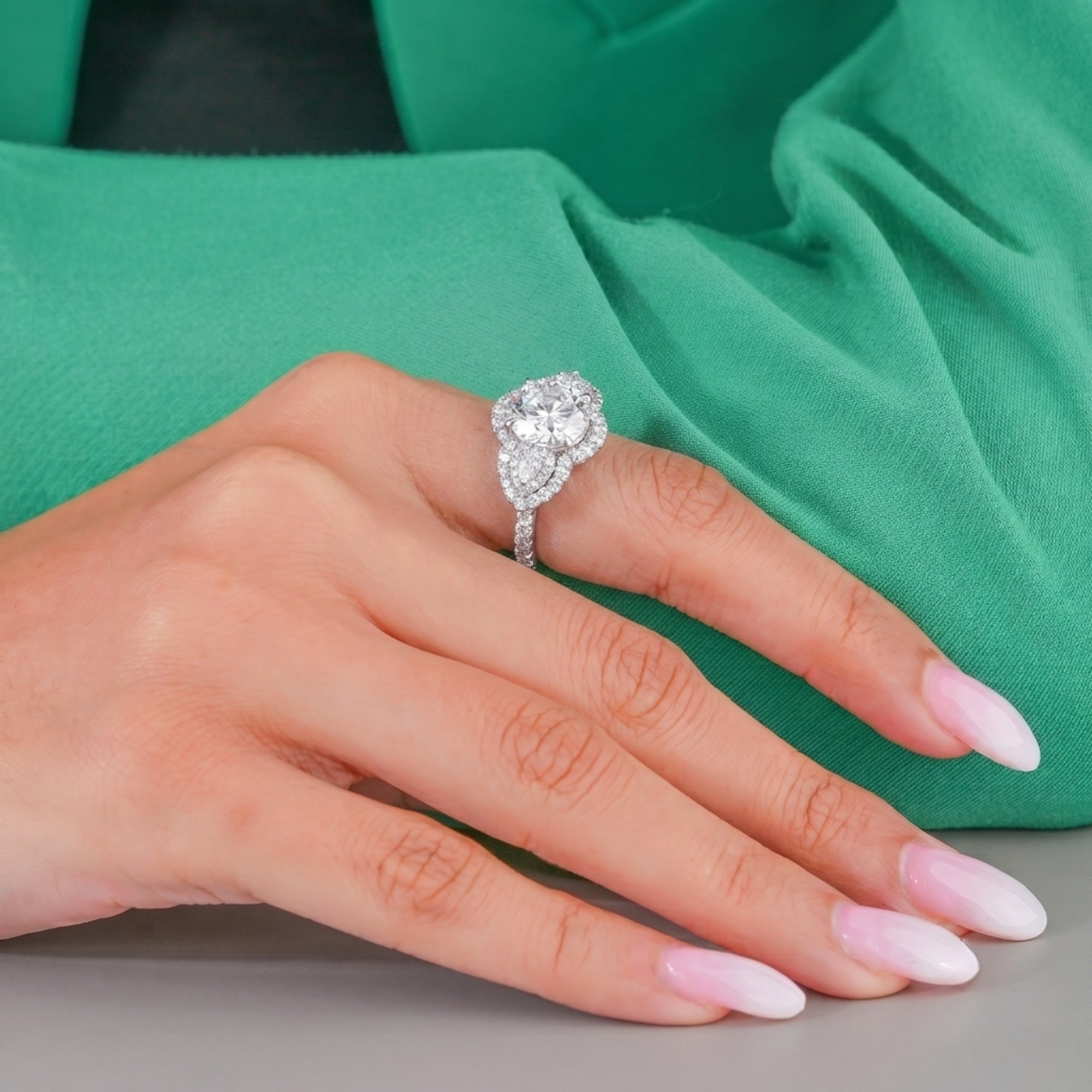 halo ring with vintage engagement ring.
