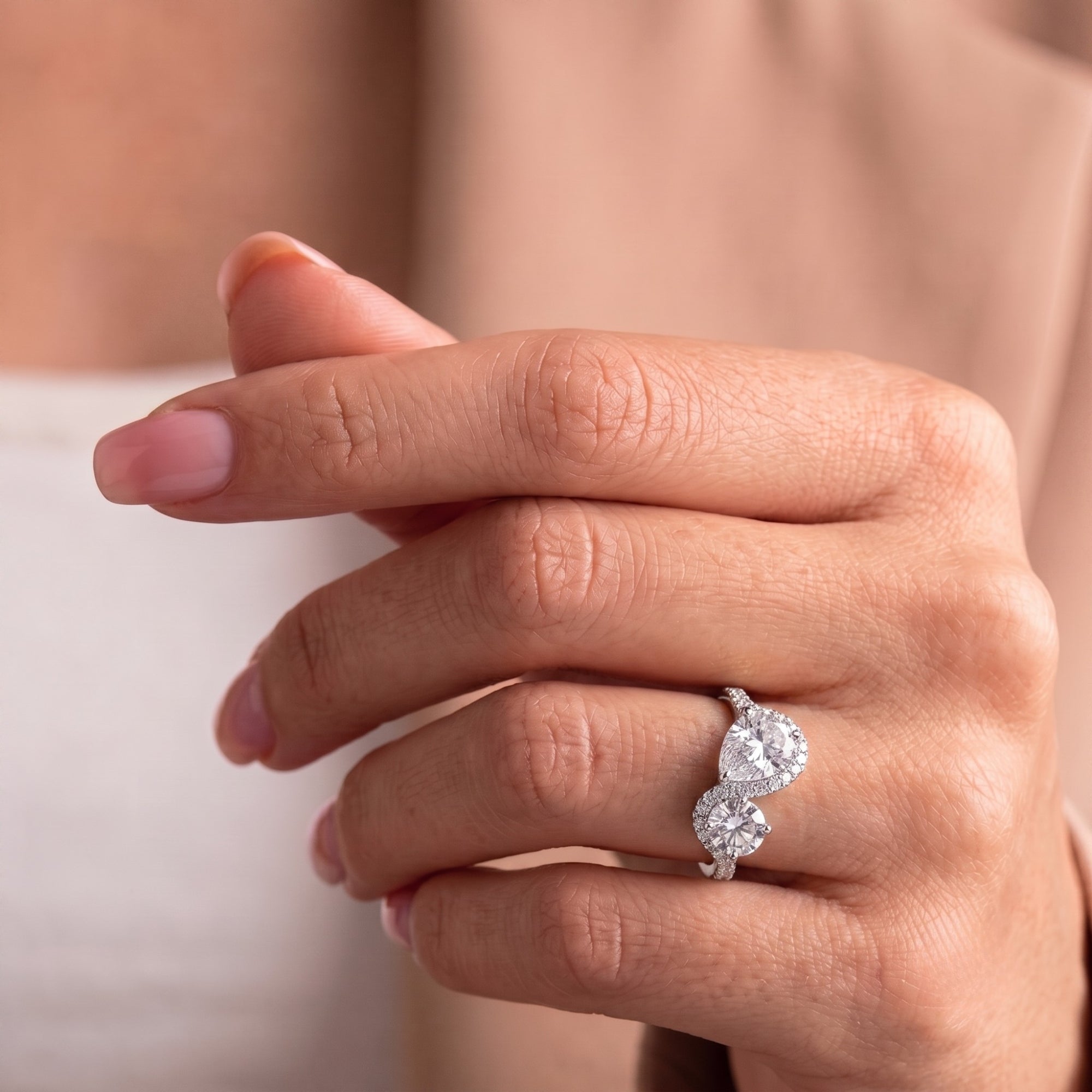 Pear diamond ring with round ring.
