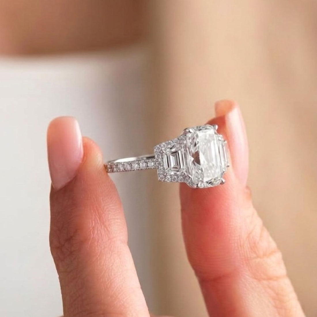 trapezoid diamond ring with claw prong ring.
