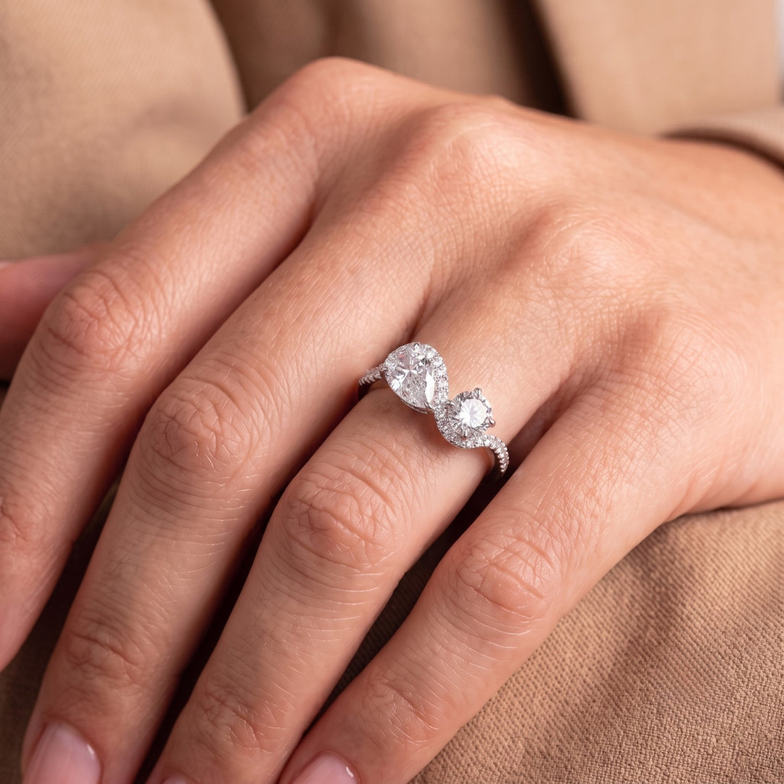 Pave diamond band setting with bypass engagement ring.
