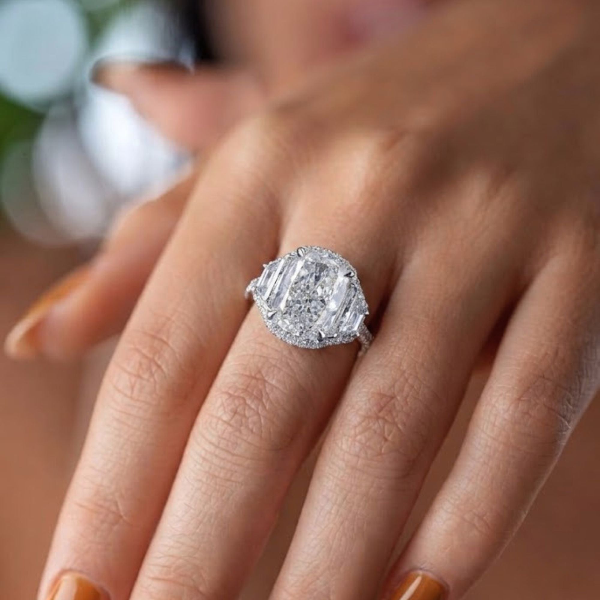 halo diamond ring with past present future ring.
