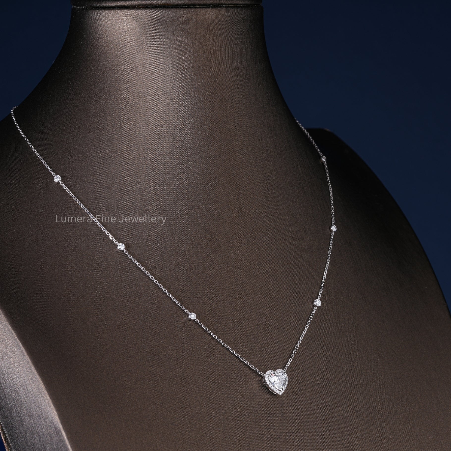 diamond heart pendant with floating heart diamond pendant.
