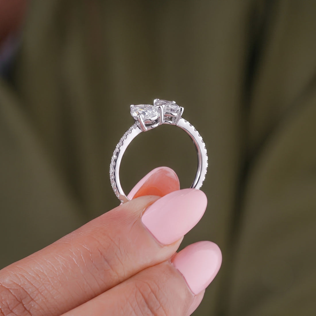 pear and emerald cut ring with pave band ring.
