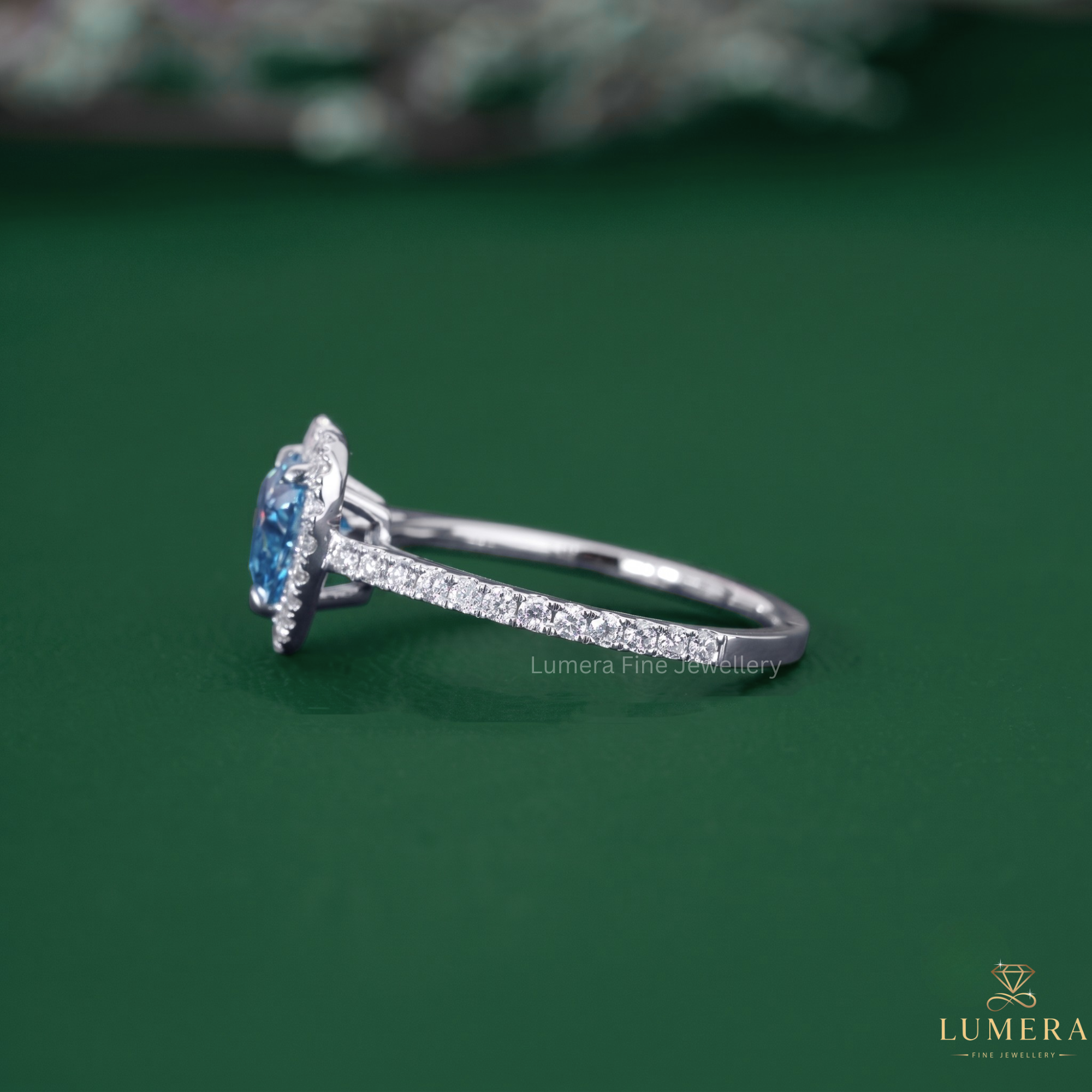 Blue stone ring with pave engagement ring.