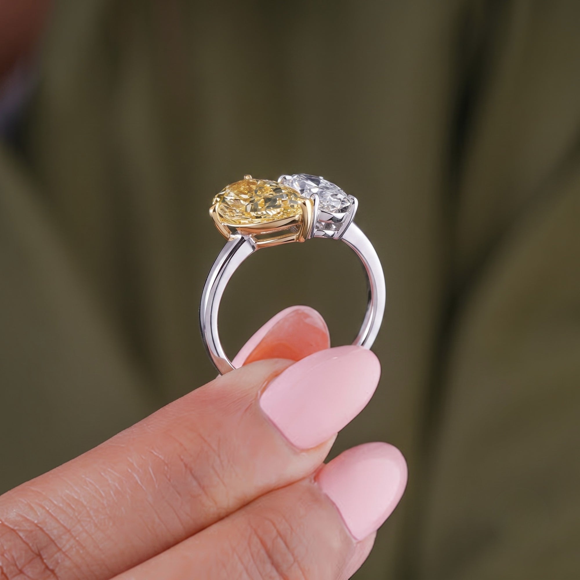pear diamond ring with oval cut diamond ring.
