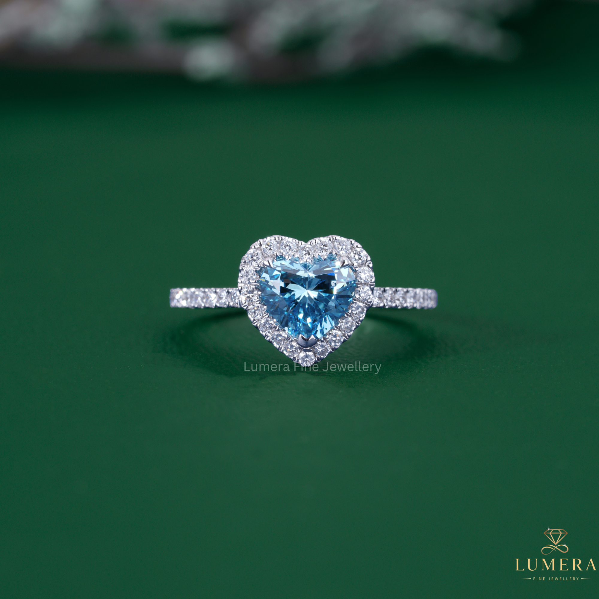 Heart Shape Diamond Ring with cathedral setting ring.