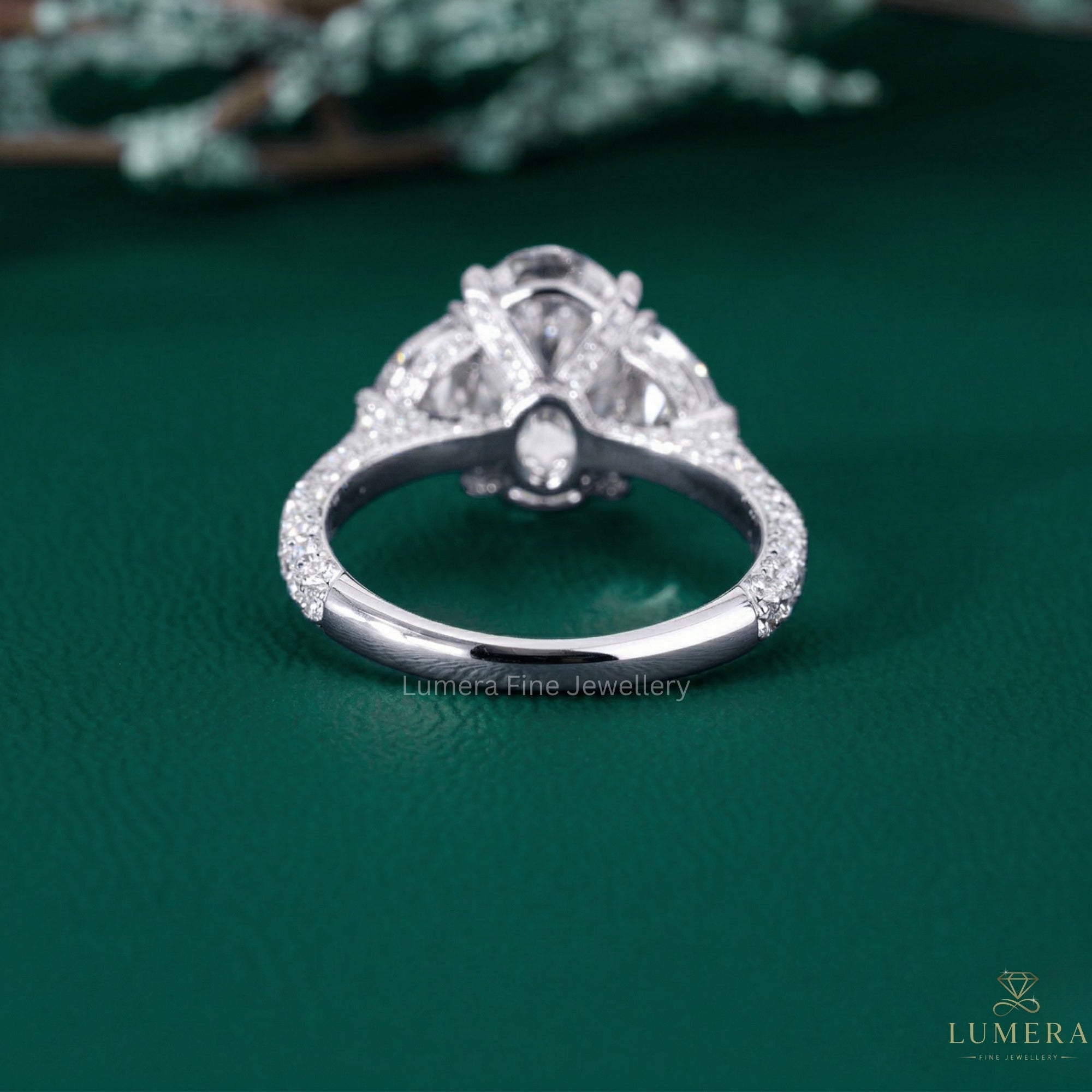 3 stone engagement ring with oval 3 stone ring.