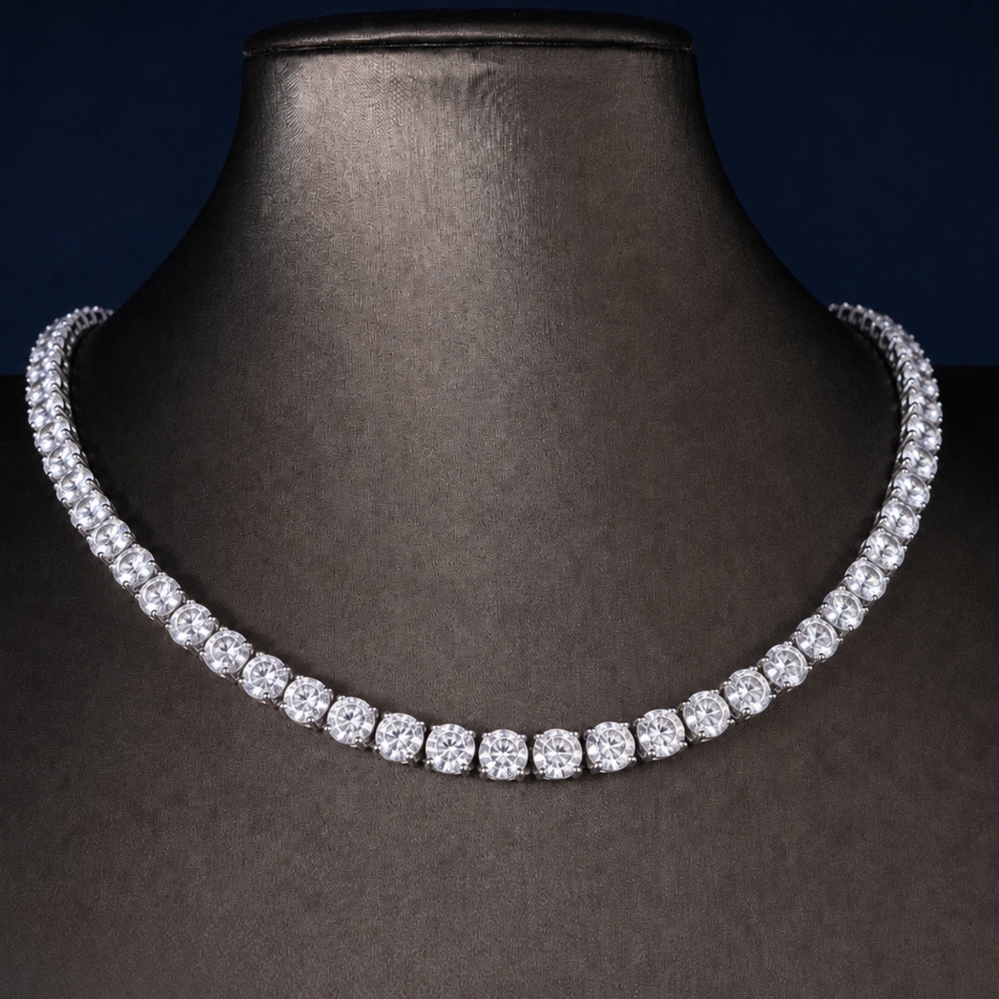 round tennis necklace with inline round diamond chain.