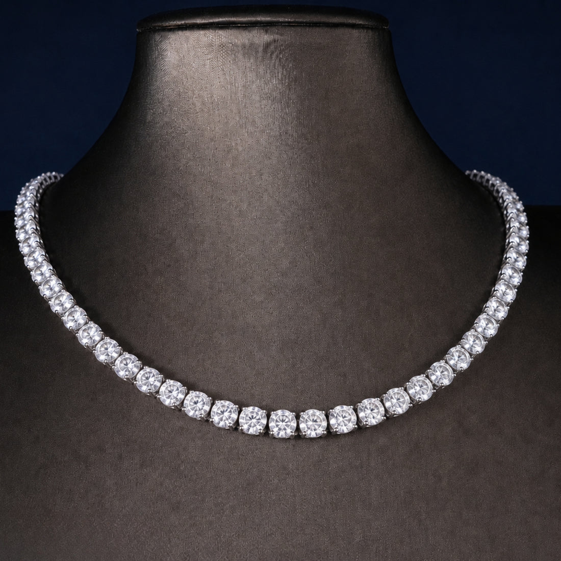 round tennis necklace with inline round diamond chain.