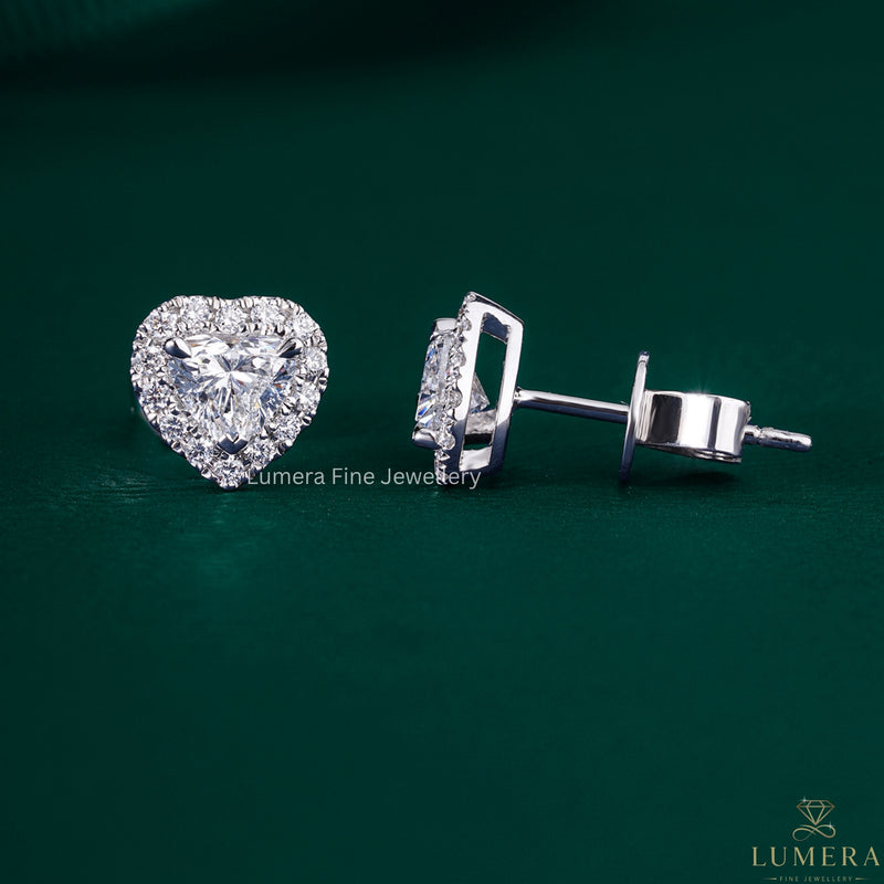 diamond heart halo earrings with heart cut earrings.
