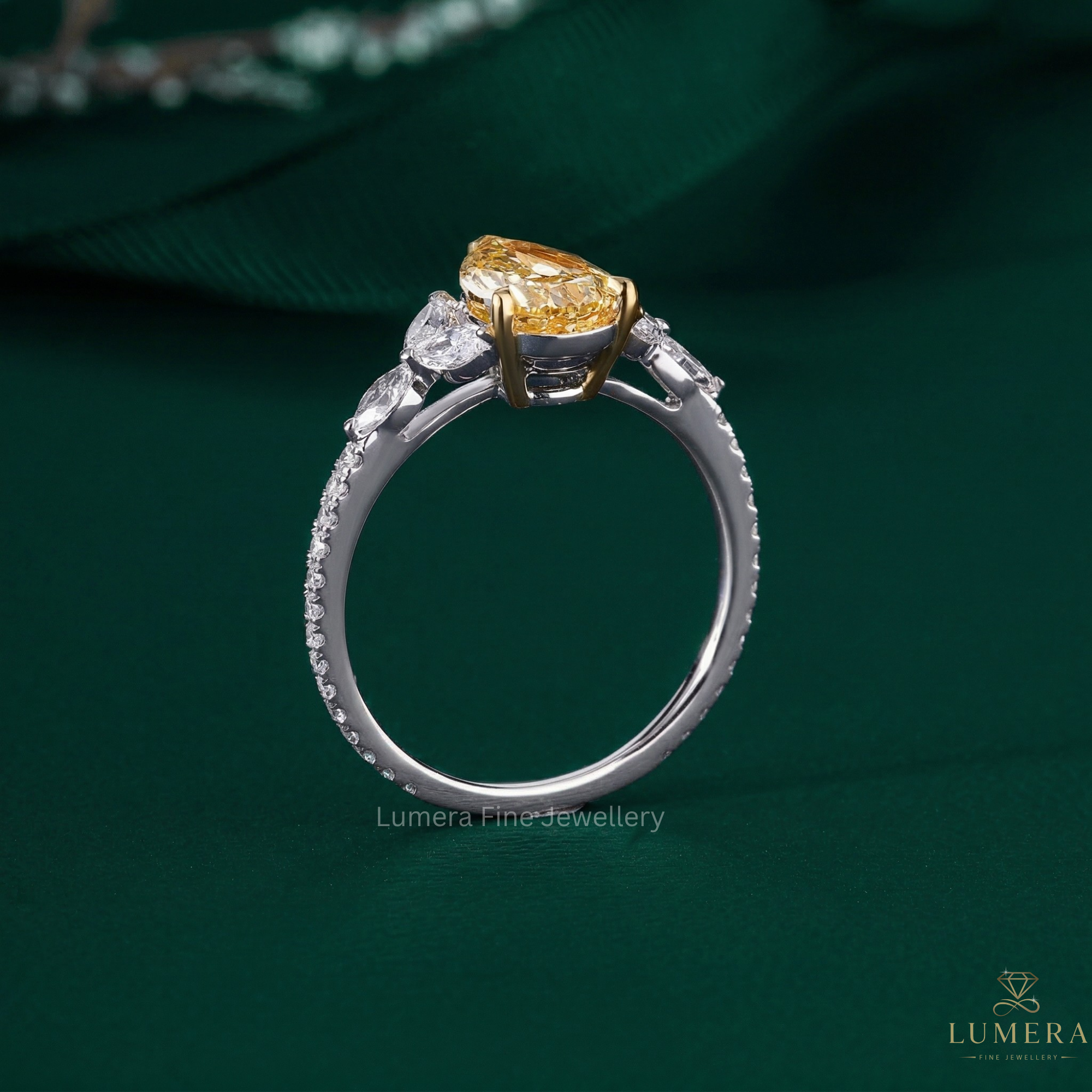 tear drop engagement ring with almond engagement ring.