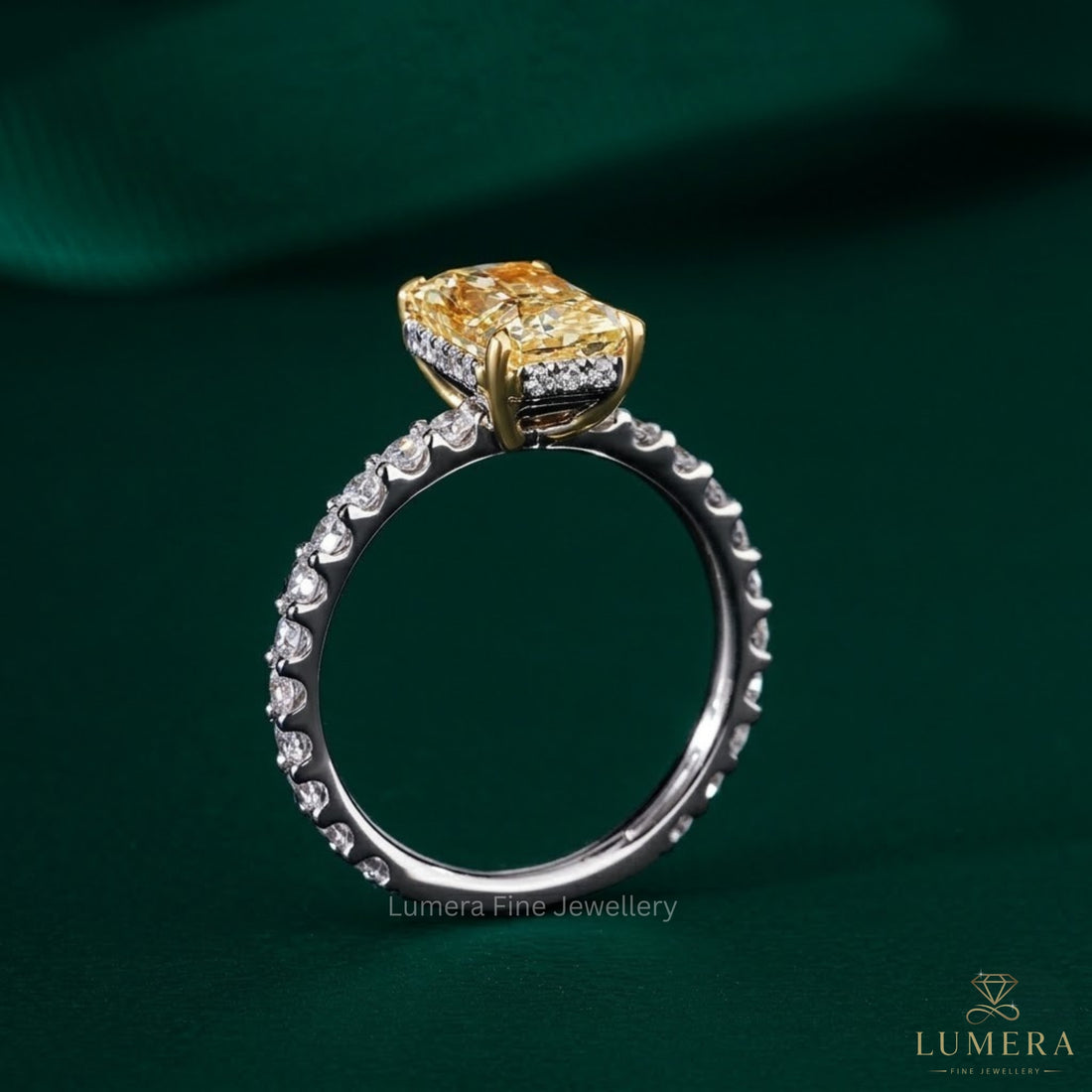 yellow diamond ring with two tone gold ring.