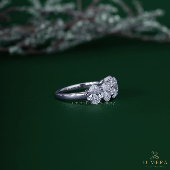 Half eternity wedding band with stackable wedding band.