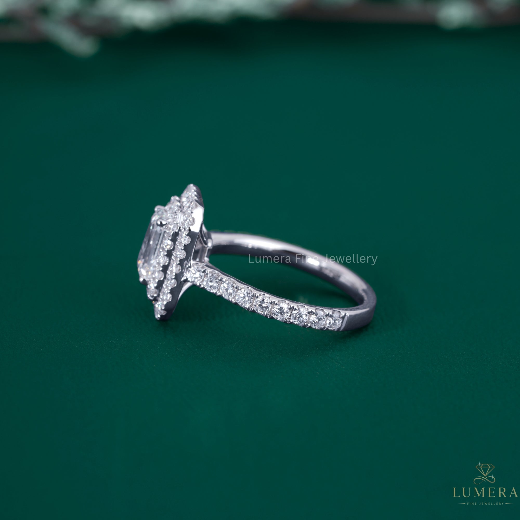 Double halo ring with round prong setting.