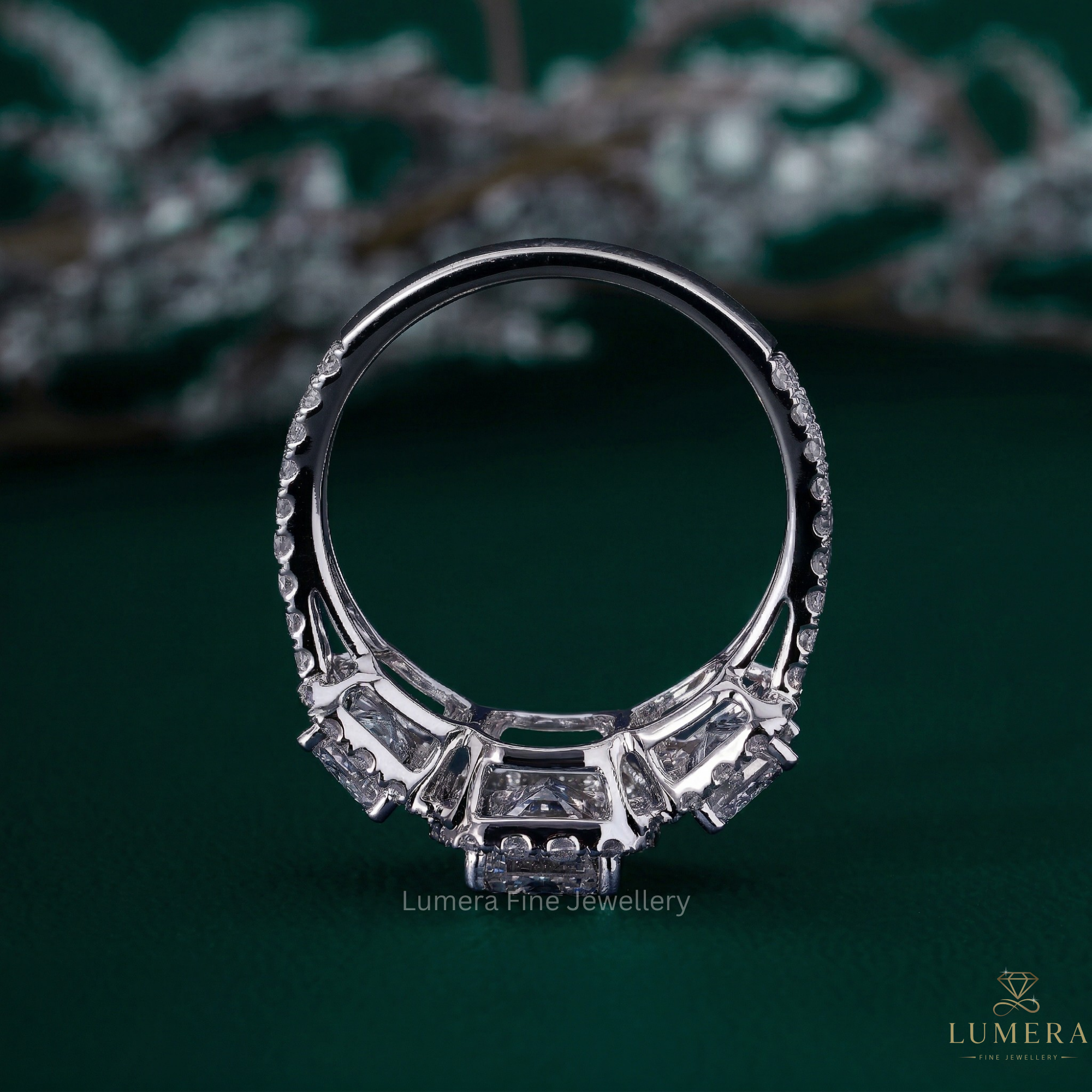 Halo setting ring with emerald diamond halo ring.