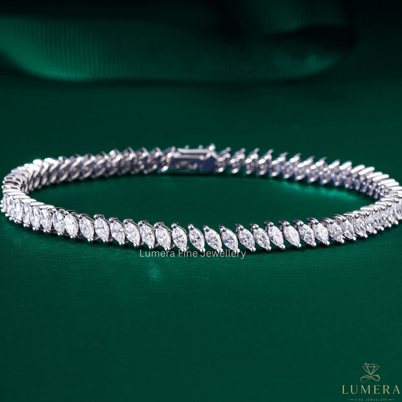 marquise diamond bracelet with tennis style setting.