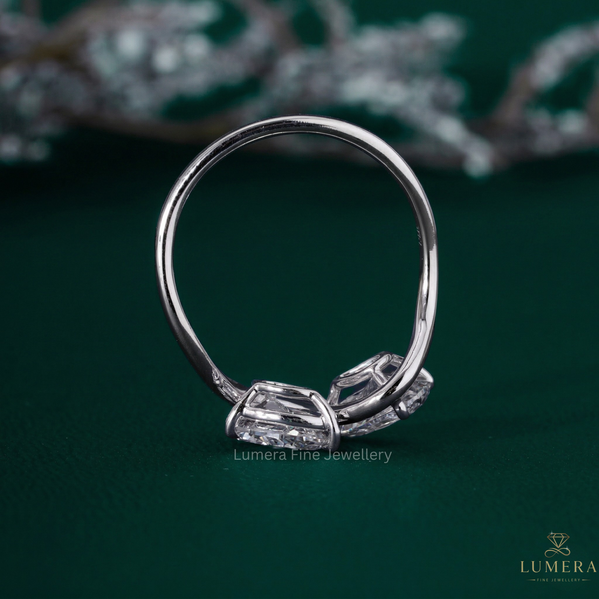 Two stone ring with Pear shaped diamond ring.