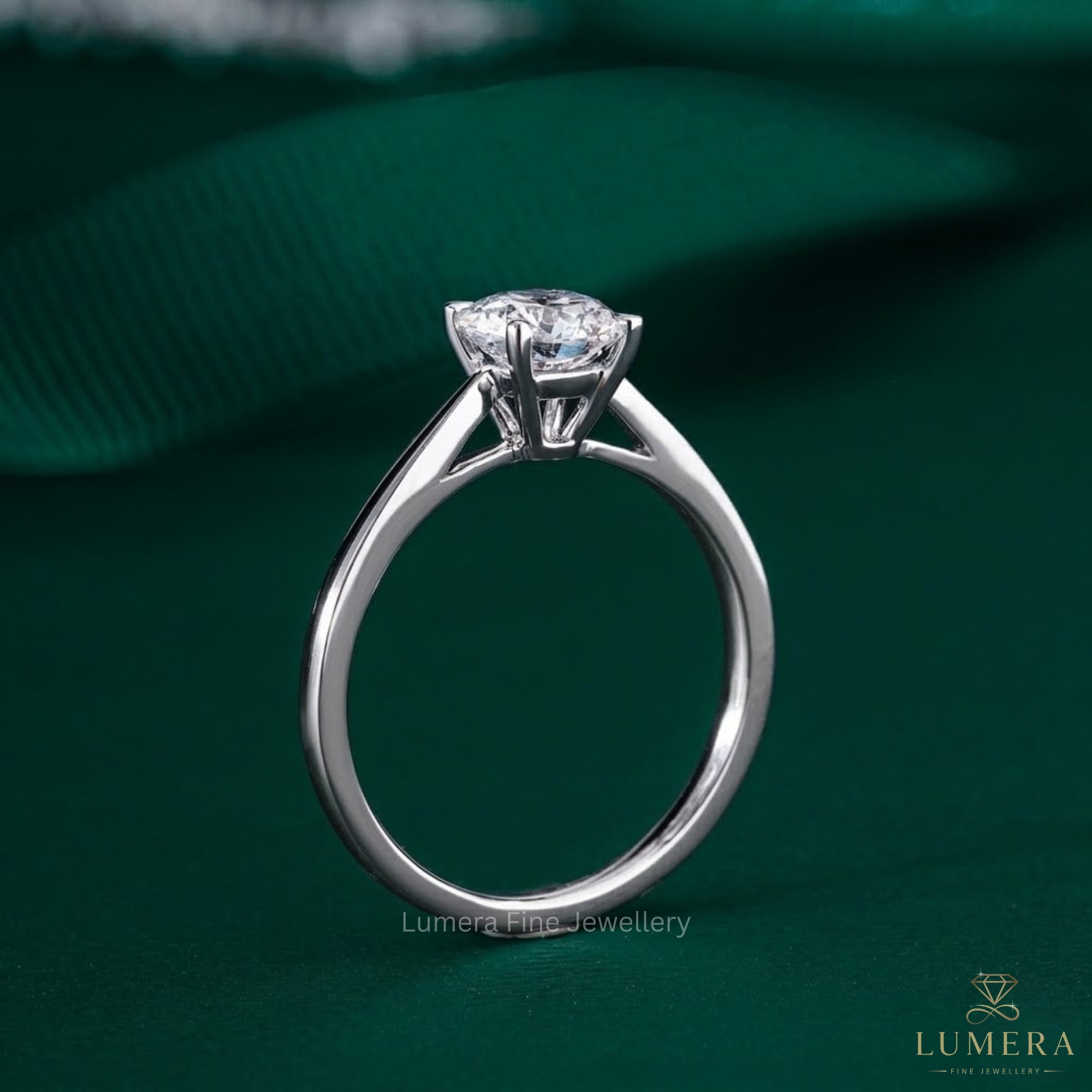 round diamond ring on simple engagement ring.
