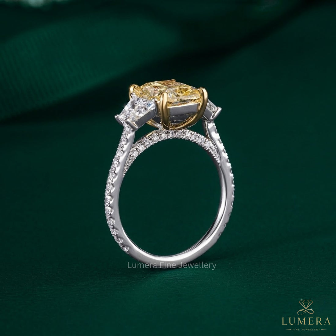 Trapezoid side stone on pave setting ring.
