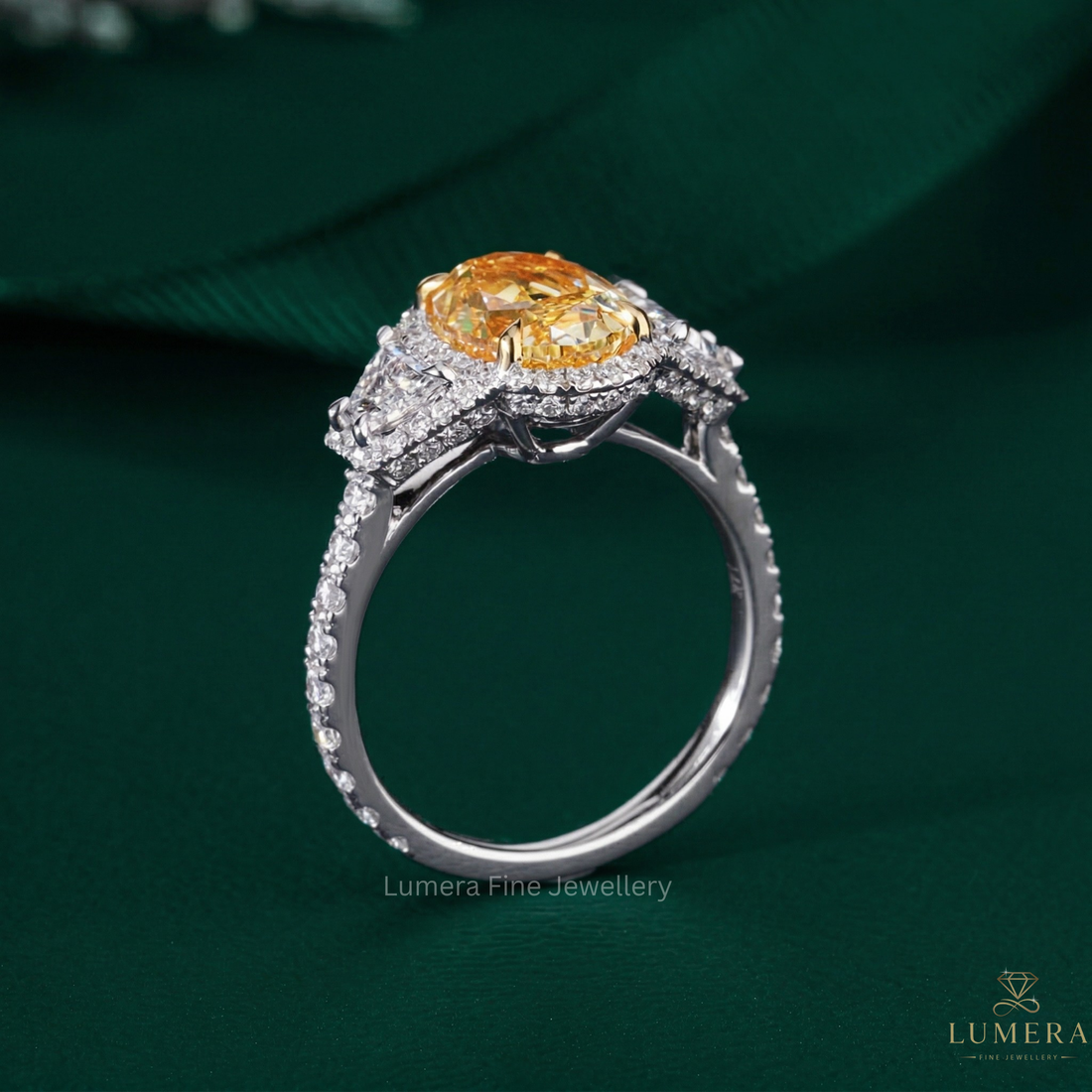 yellow diamond ring with oval cut diamond ring.