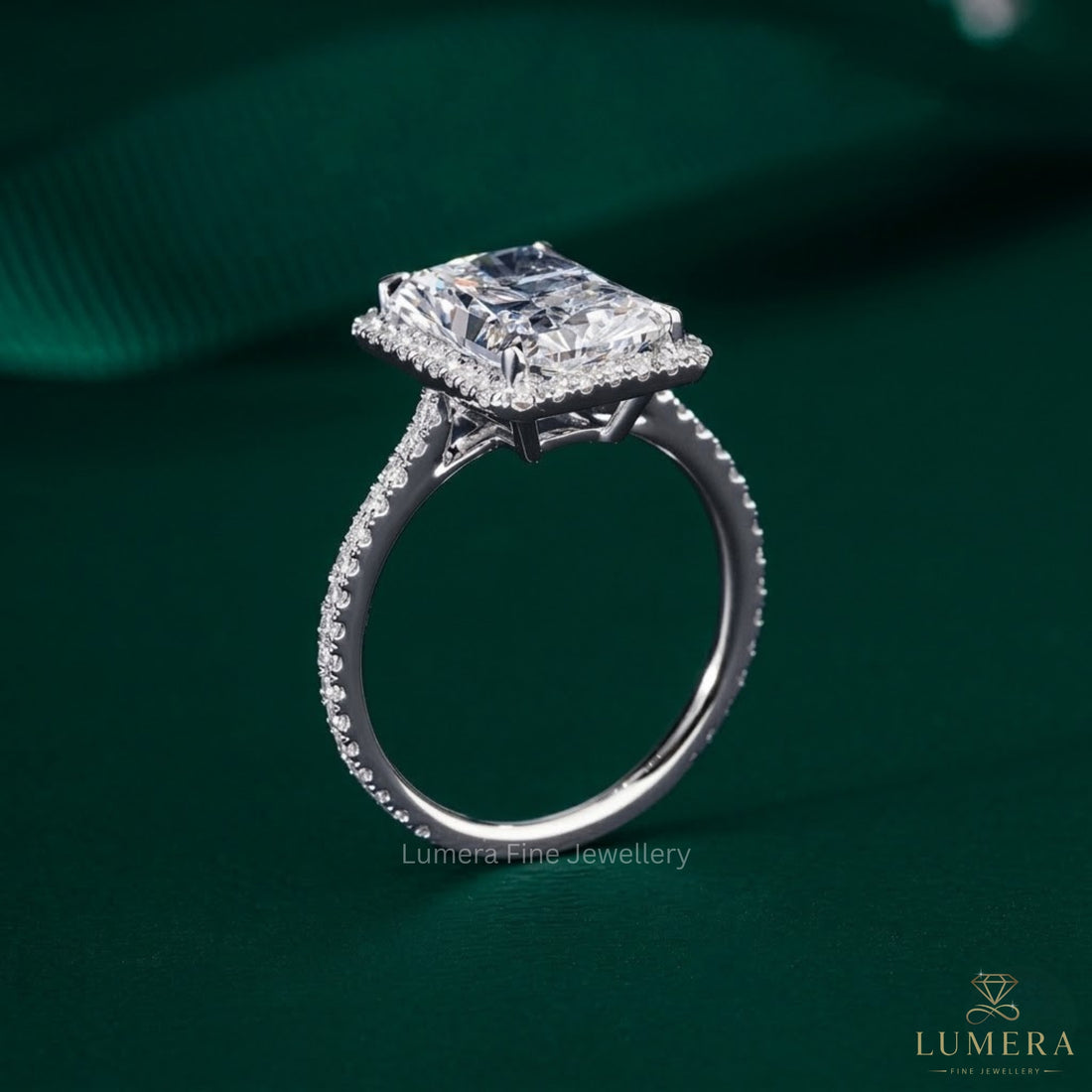 halo engagement ring on cathedral setting ring.
