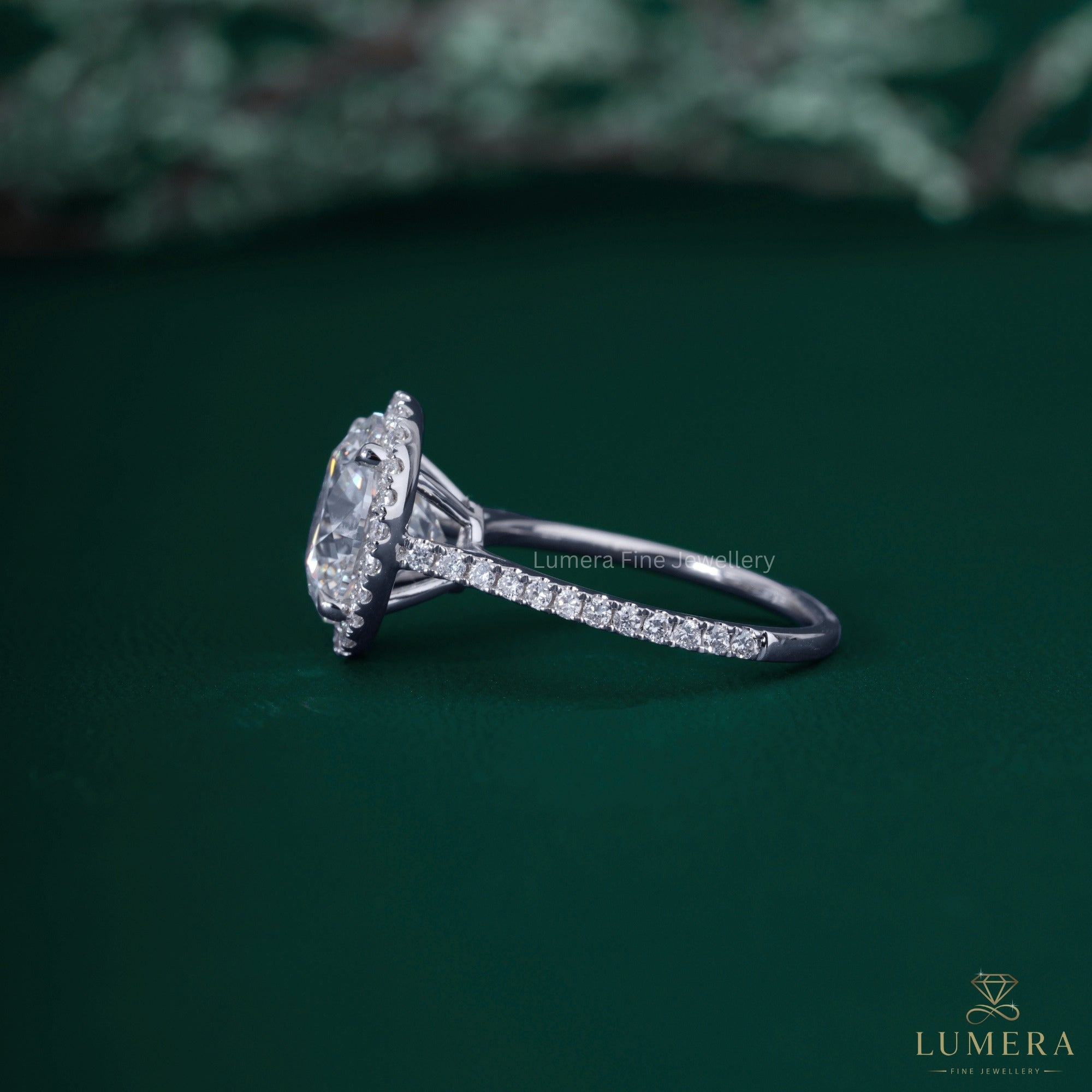 Round cut engagement ring with round cut halo ring.