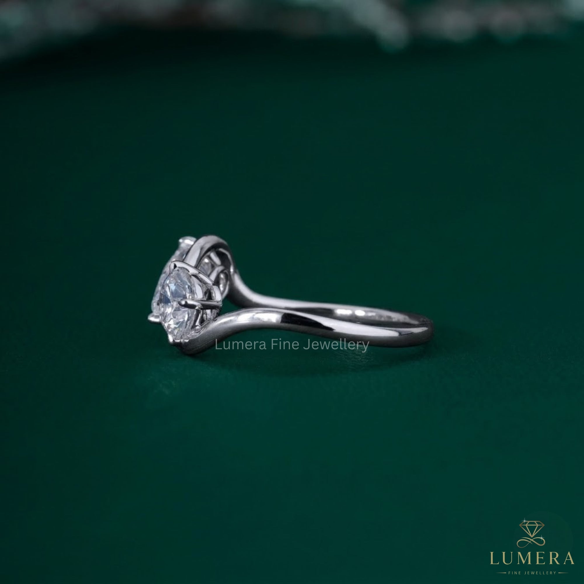 Round diamond ring with Pear diamond ring.