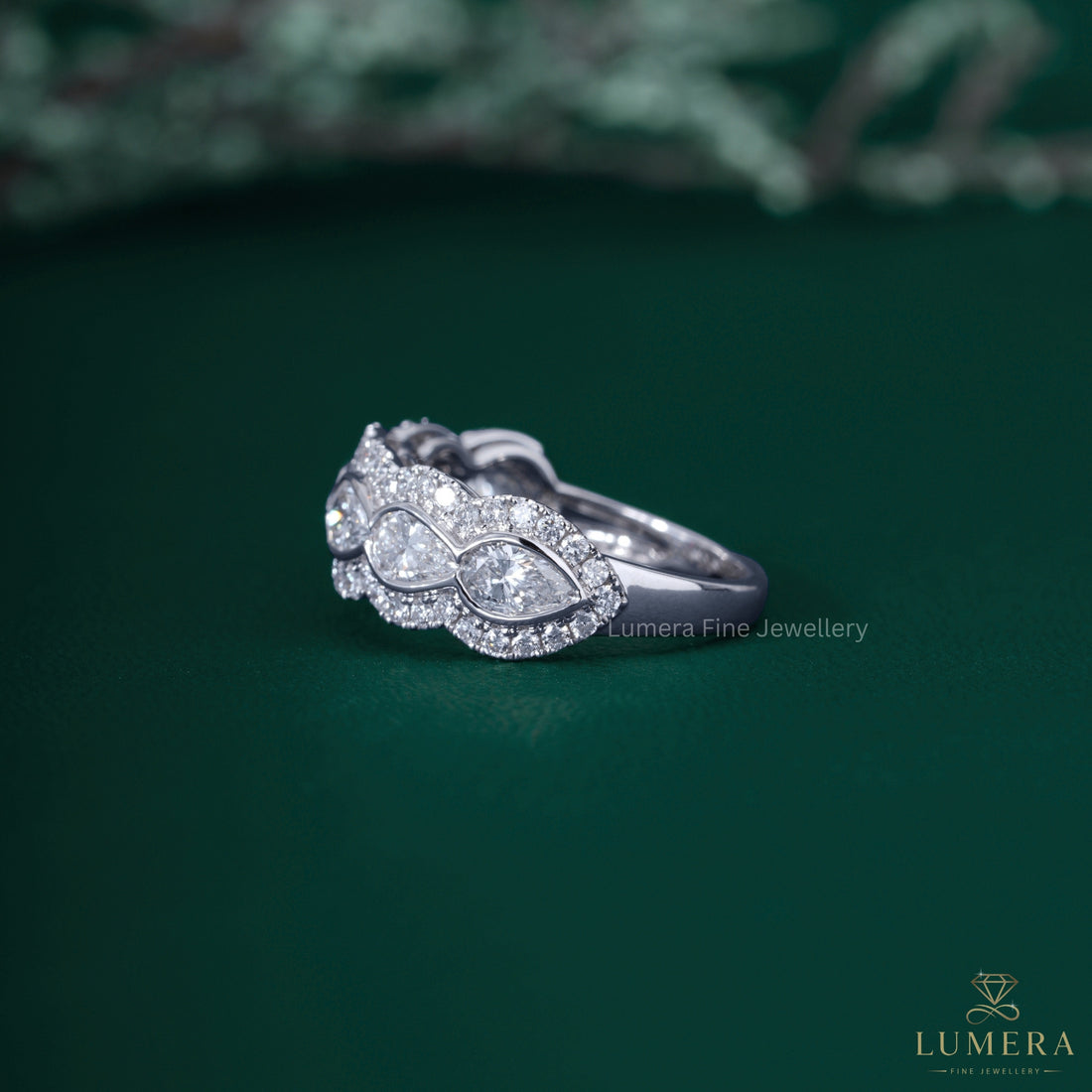 Almond shape band with halo diamond band.