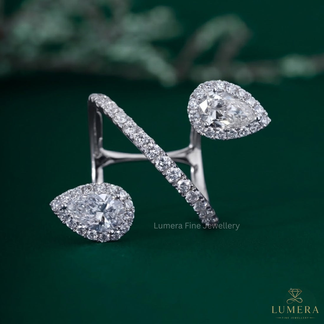 Almond diamond ring with Pear engagement ring.