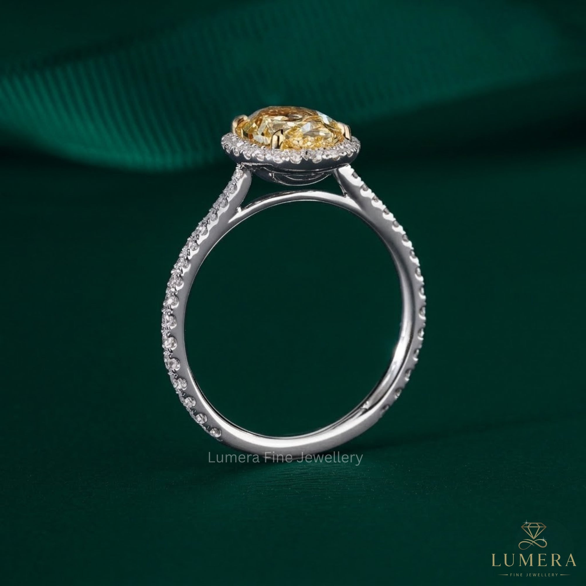 yellow diamond engagement ring with 4 prong engagement ring.