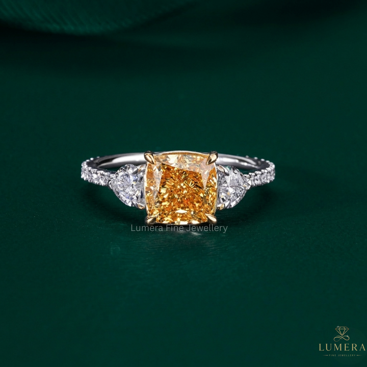 cushion diamond engagement ring with three stone engagement ring.
