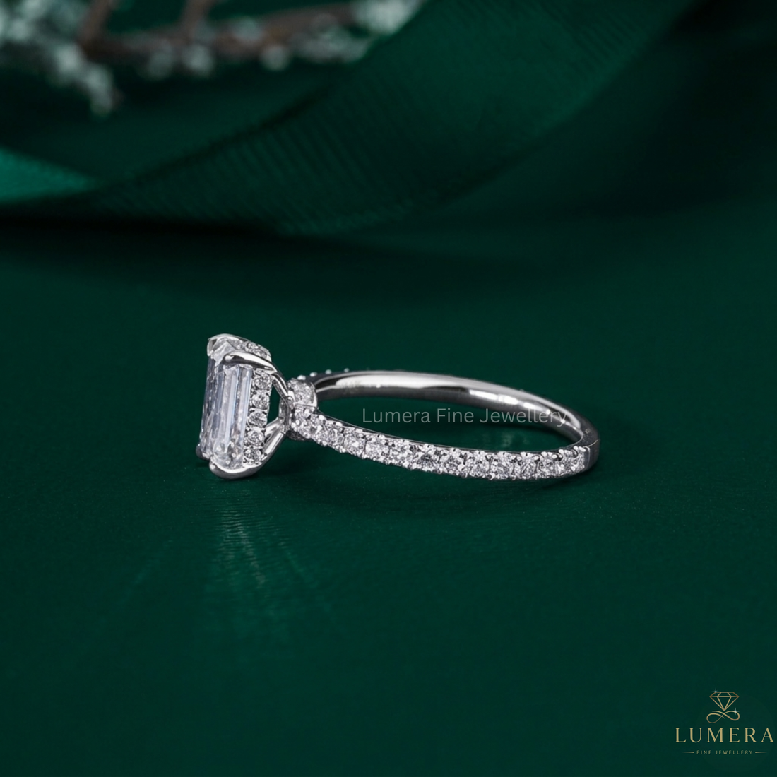 Emerald Cut Diamond Ring with double hidden halo setting.

