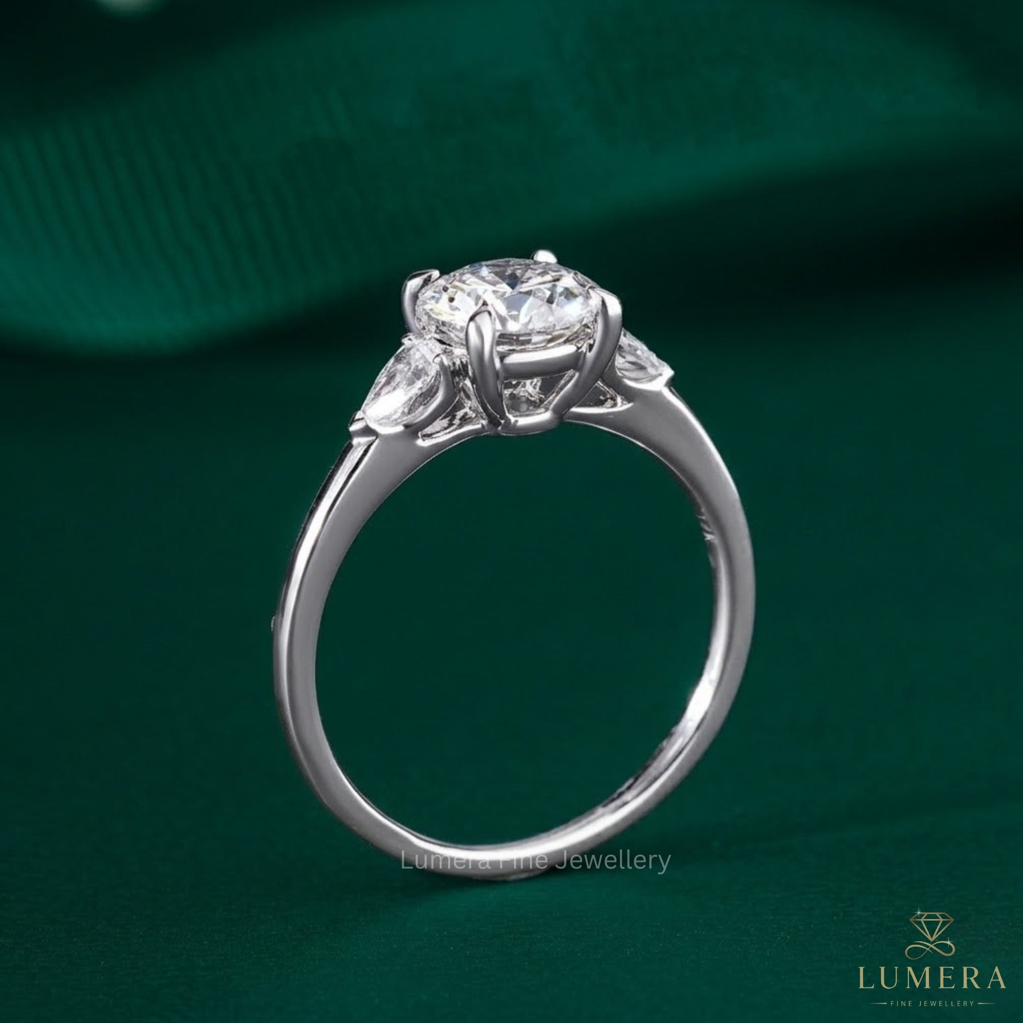 pave diamond ring with round cut side stone.