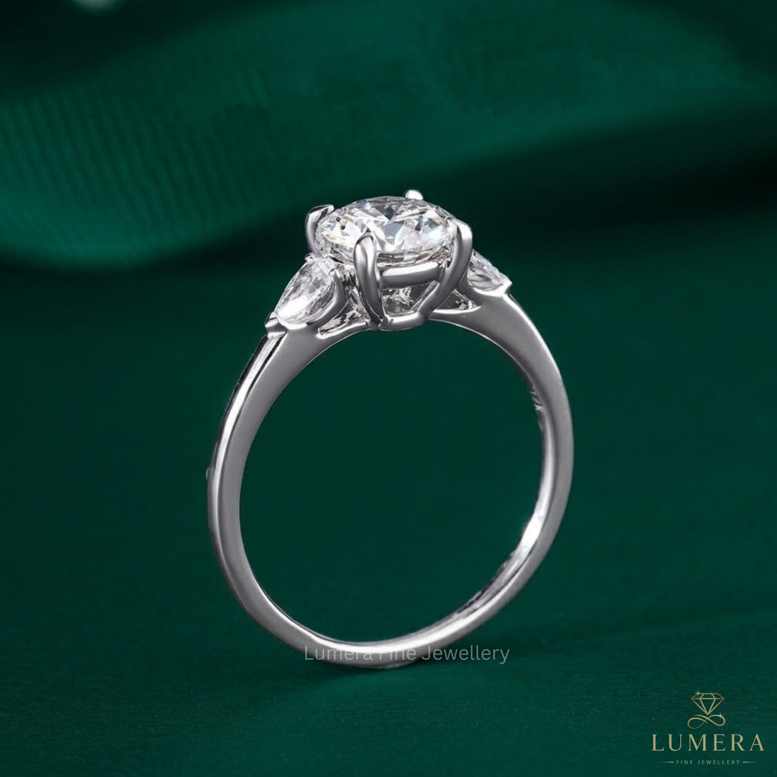pave diamond ring with round cut side stone.