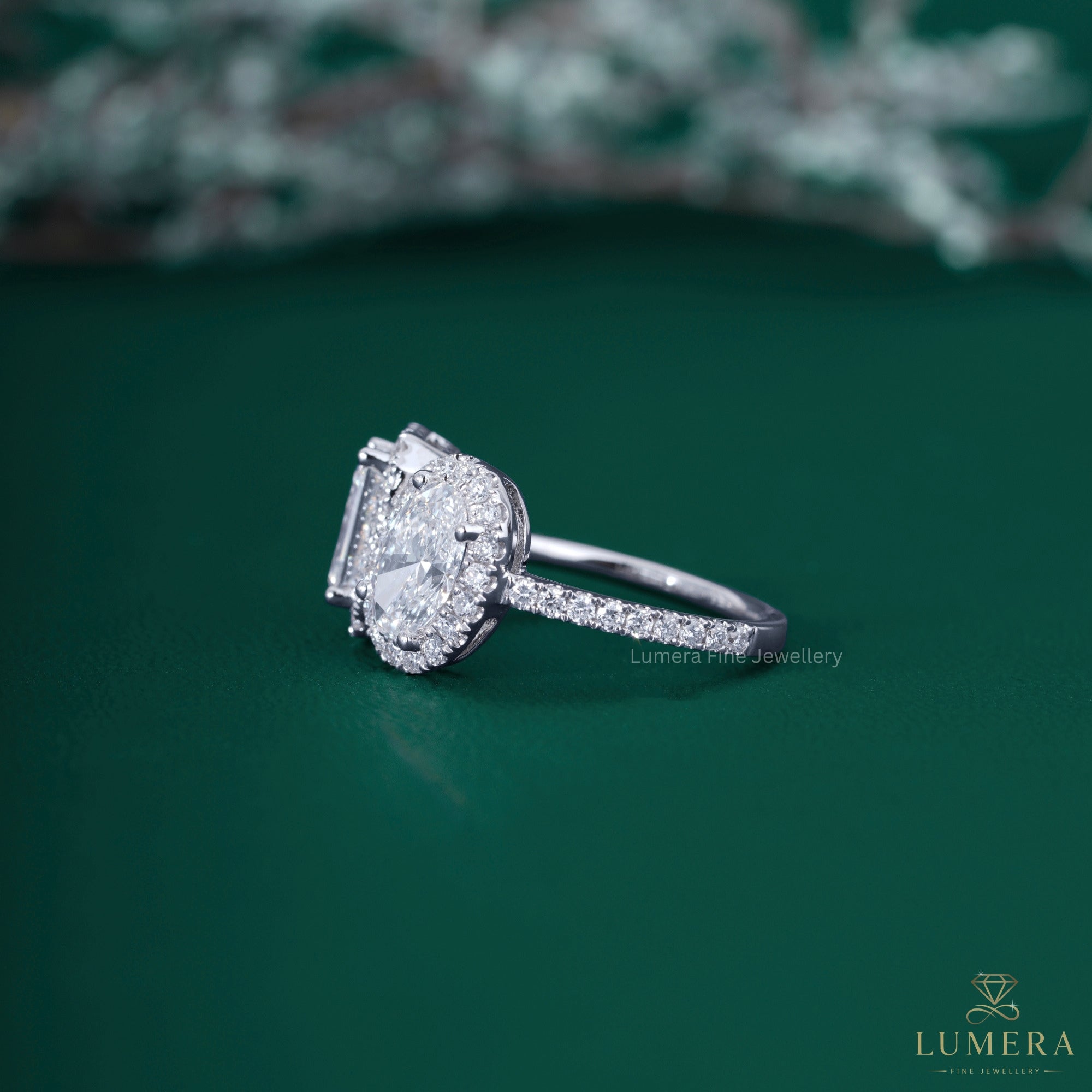 Oval cut ring with Toi et moi engagement ring.