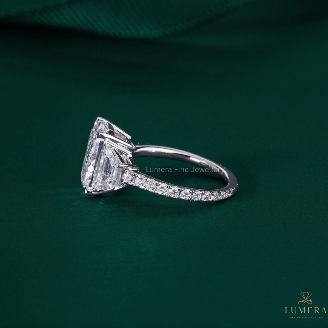 trapezoid side stone with pave setting ring.
