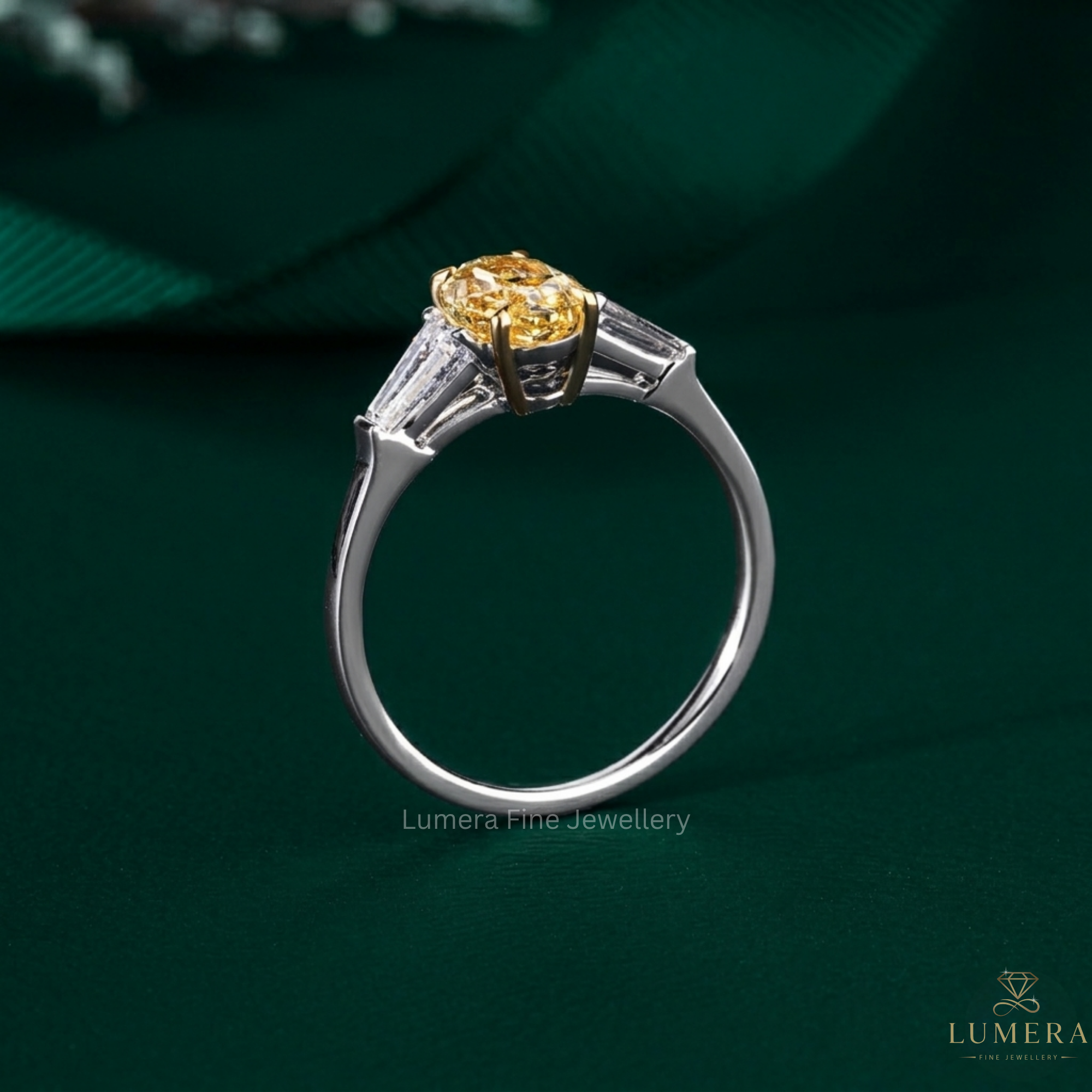 Oval diamond ring with Oval with tapered baguette.