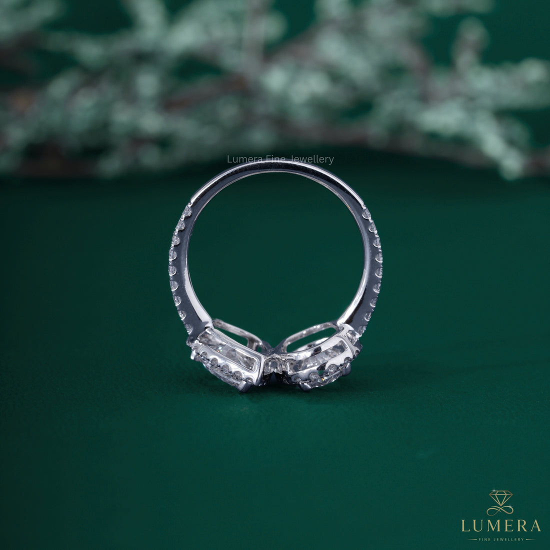 Pear shaped diamond ring with pear diamond ring.