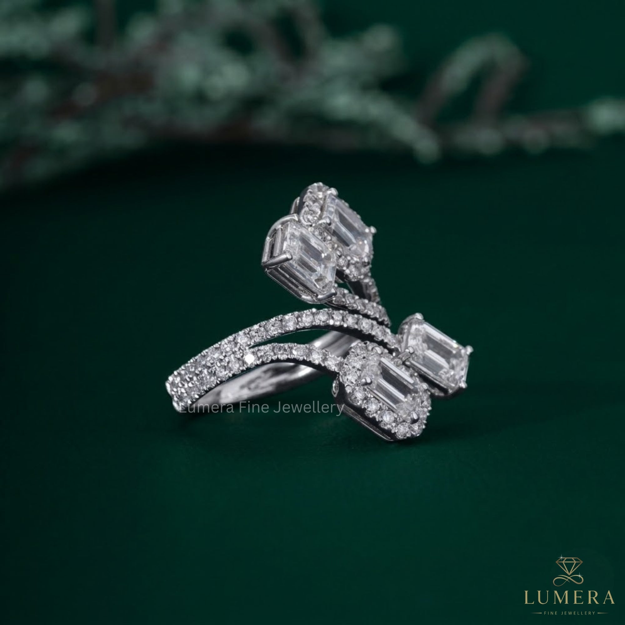 Halo setting ring with emerald diamond halo ring.