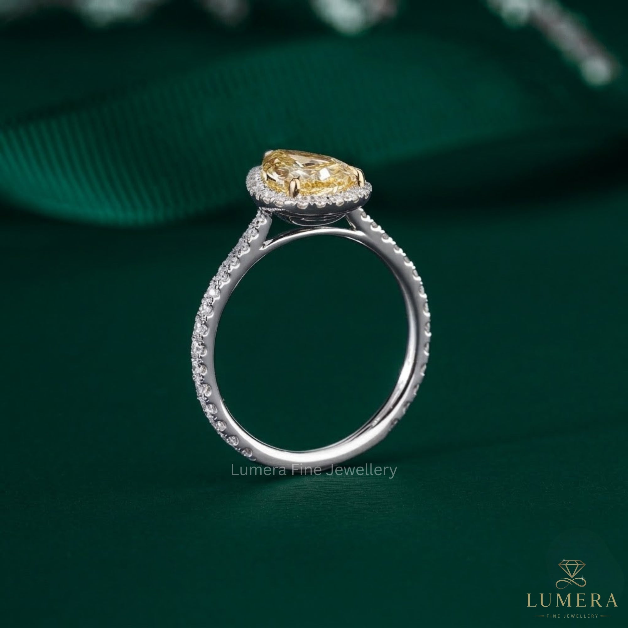 pear shape engagement ring with V prong setting.