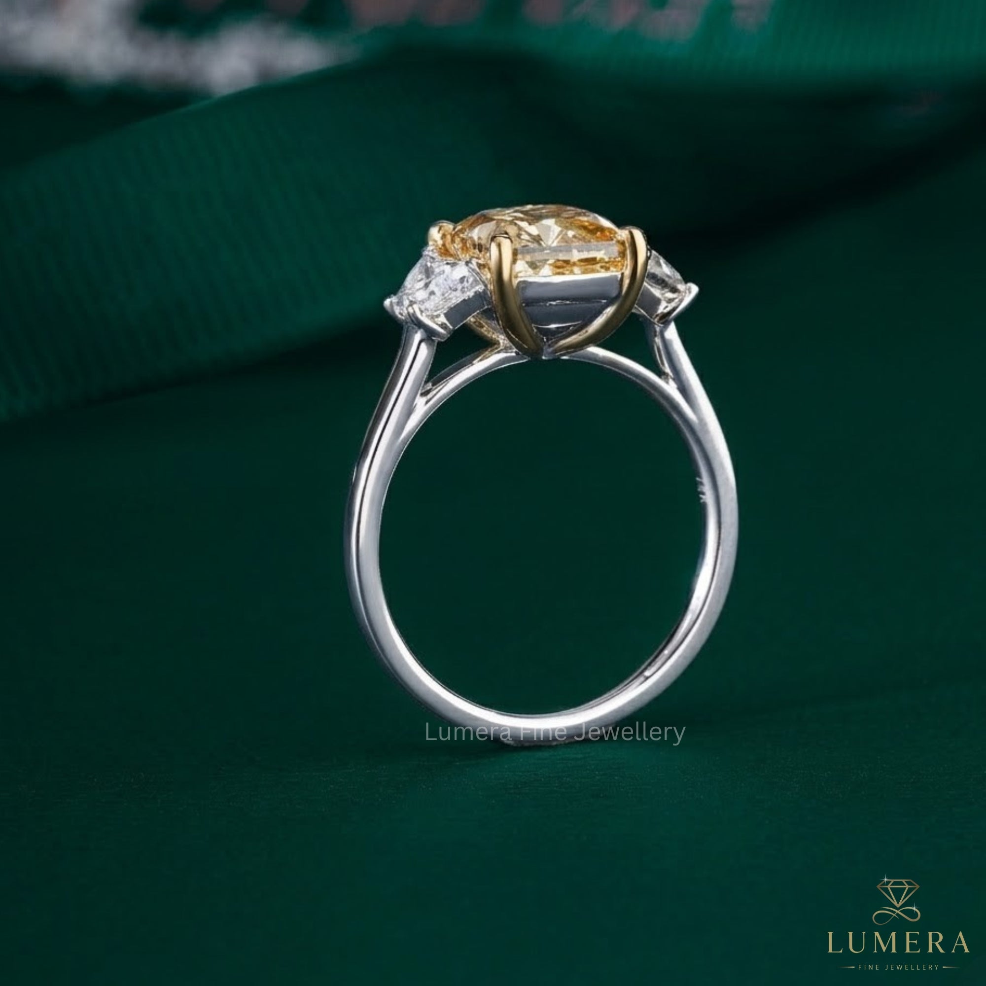 cushion engagement ring with round prong setting.