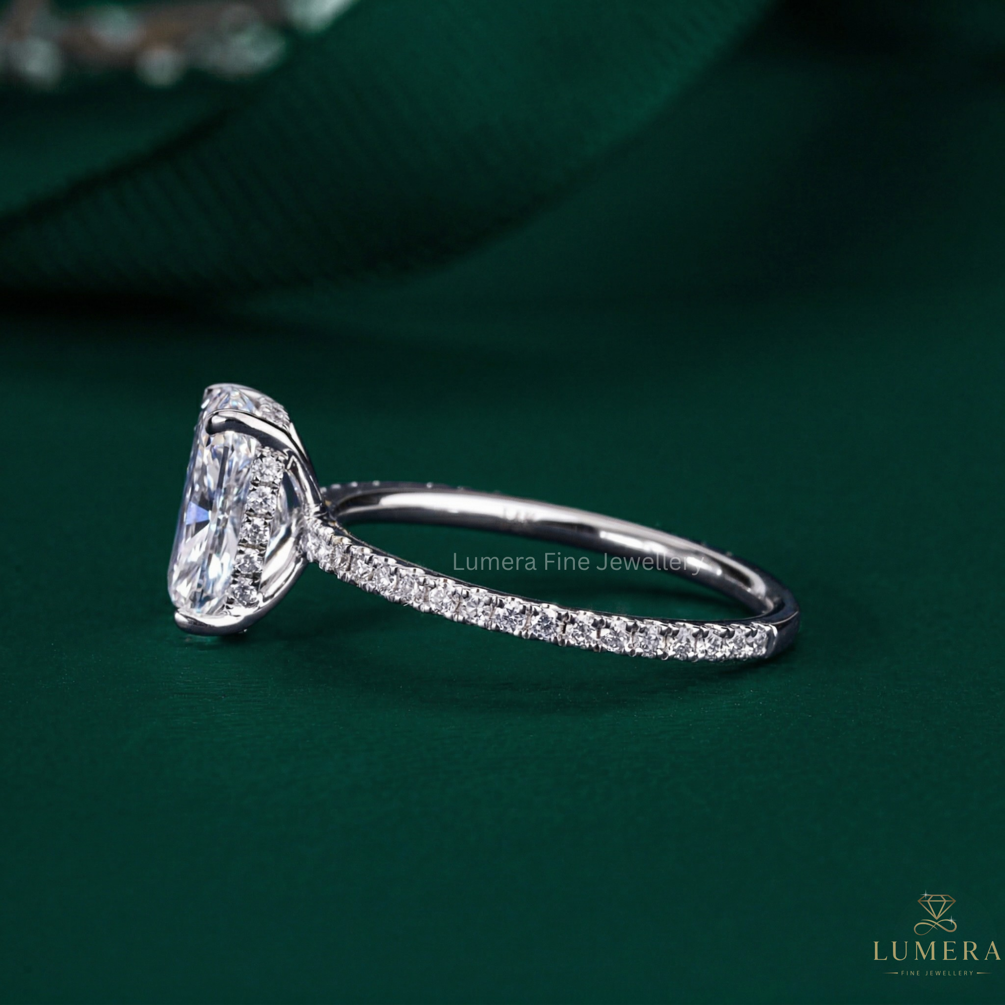 pave diamond ring with round cut side stone