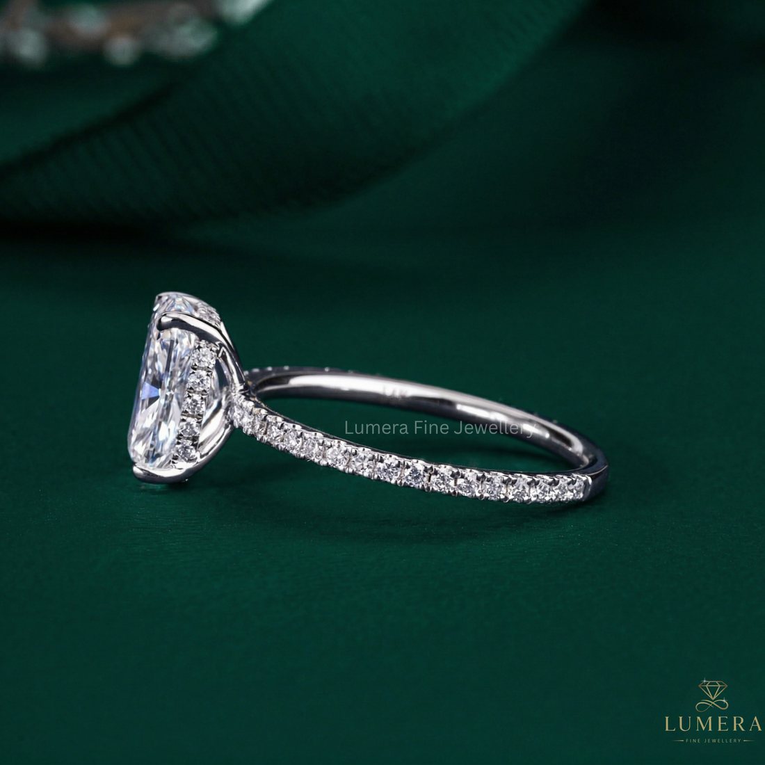 pave diamond ring with round cut side stone
