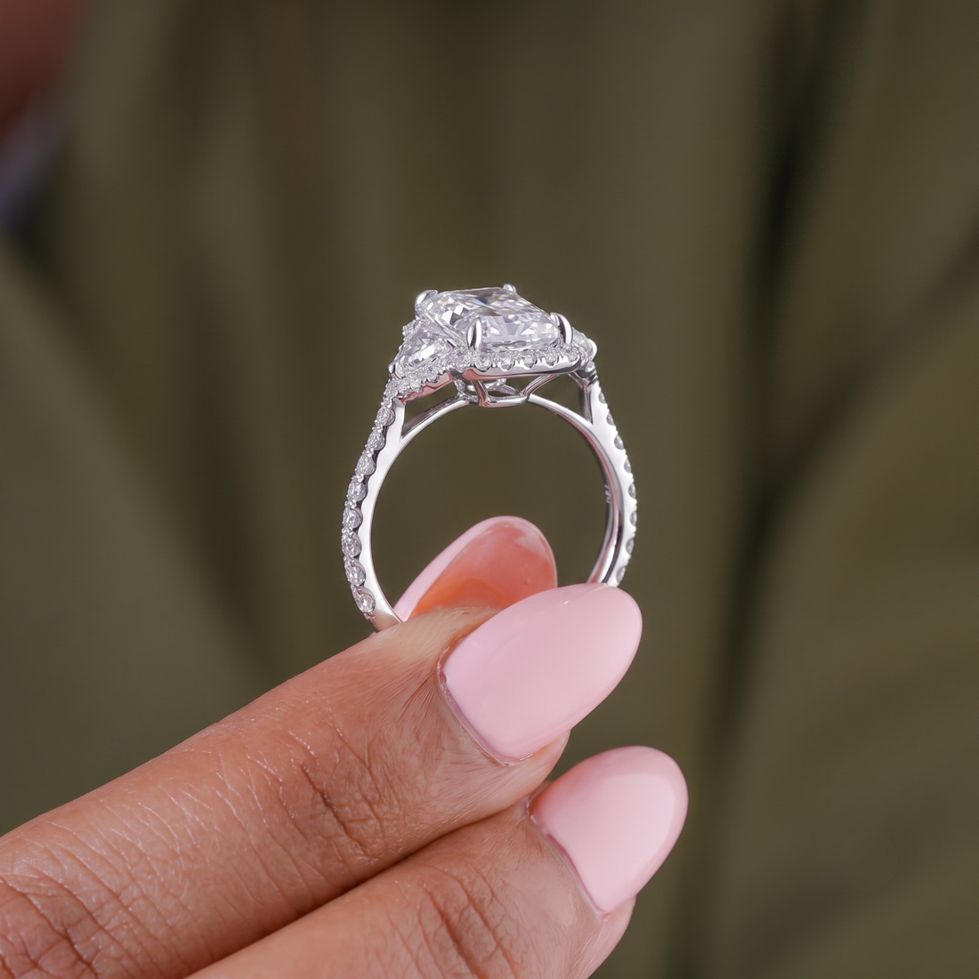 claw prong setting with solid gold ring.
