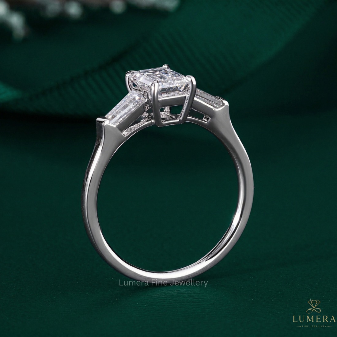 Tapered baguette side stones with Emerald with tapered baguette stones.