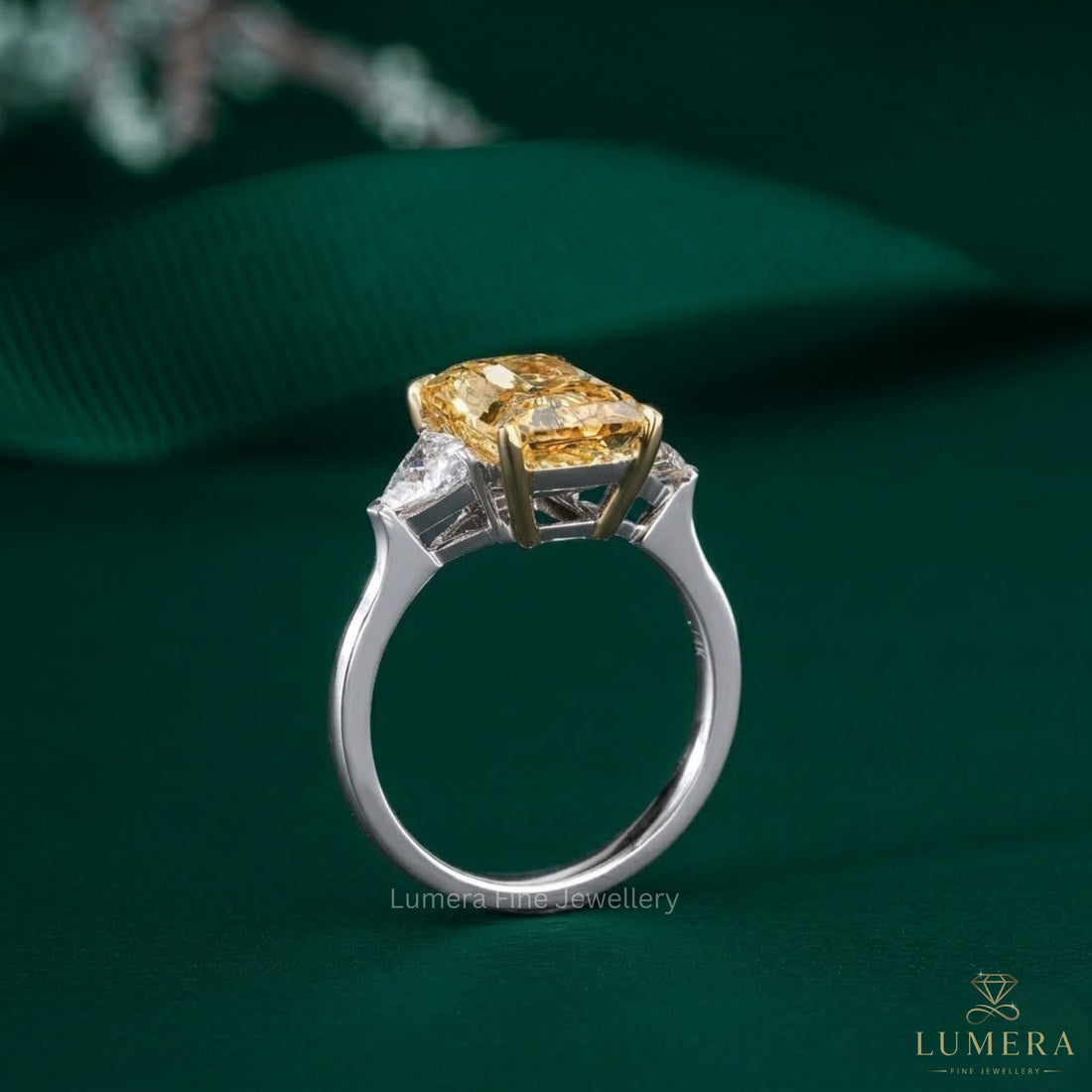 yellow Diamond Ring in yellow diamond three stone ring style.

