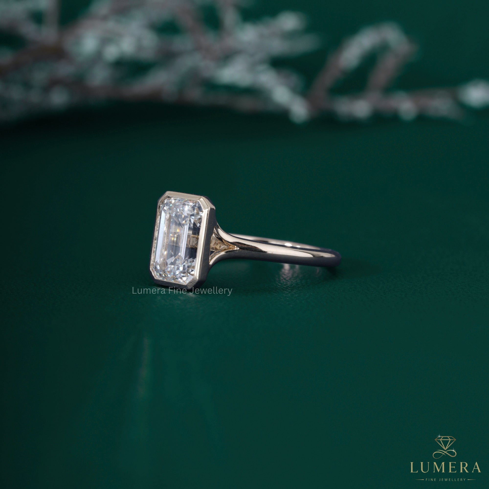 Emerald solitaire setting ring with emerald cut diamond ring.